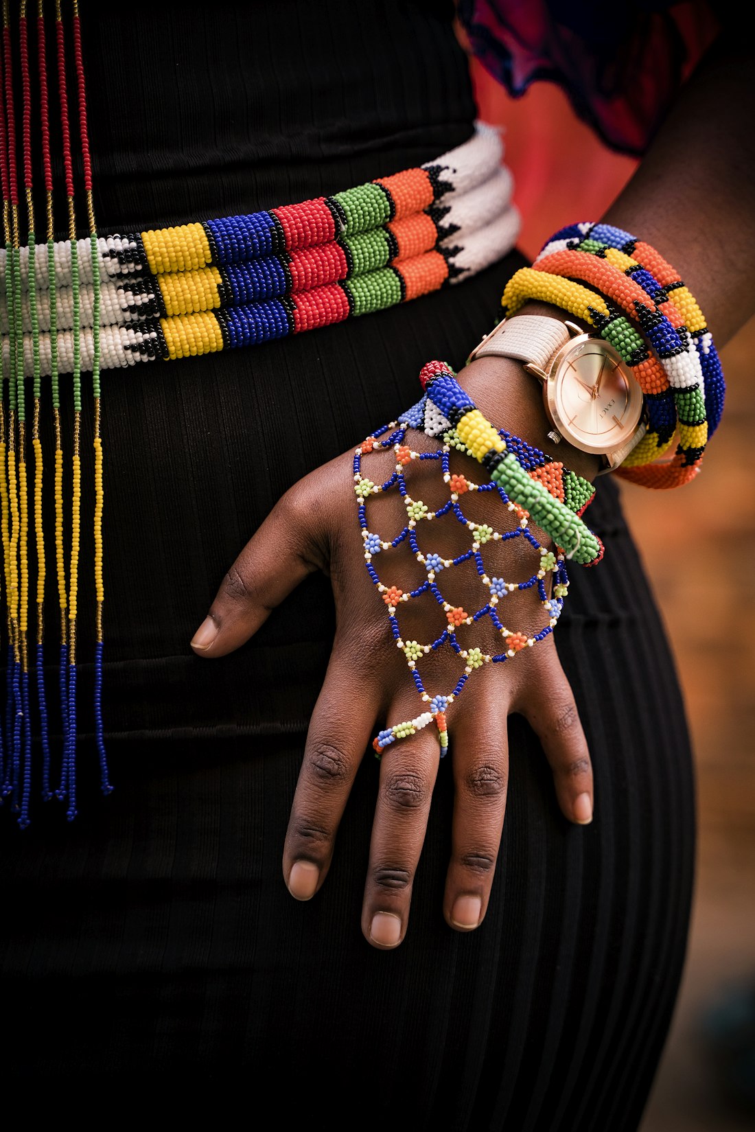 Model wearing beaded jewelry